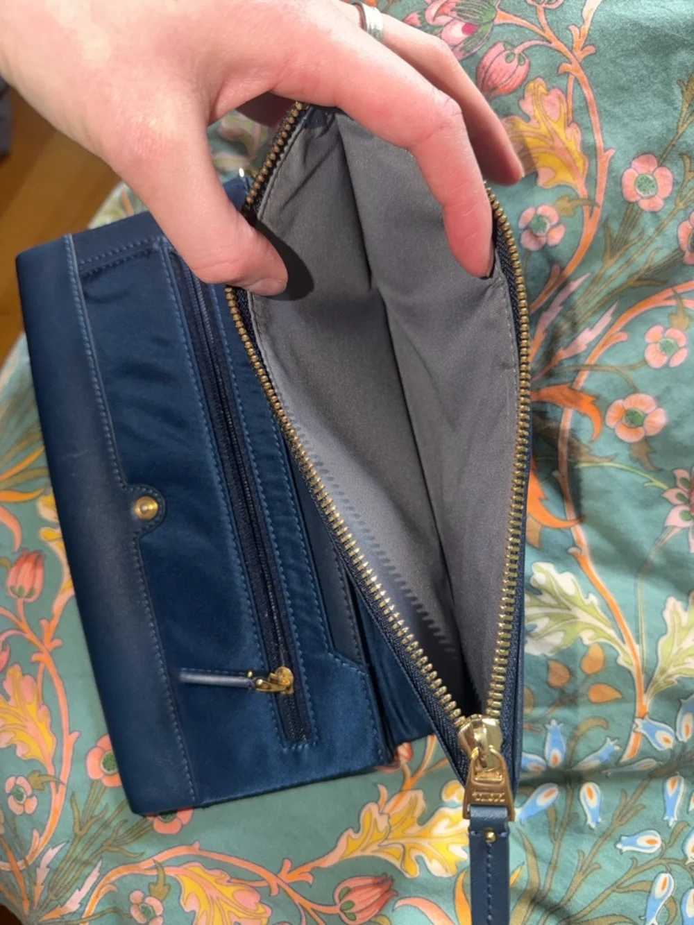 Tumi Navy Fold-Over Wristlet Clutch with Gold Hardware